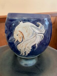 Pot with carved unicorn