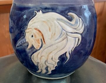 Pot with carved unicorn