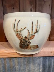 Pot with carved_painted elk