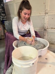 Lady on pottery wheel