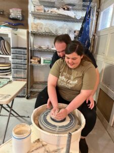 Couple on the pottery wheel