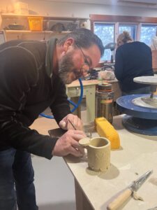 Jerome makes pottery