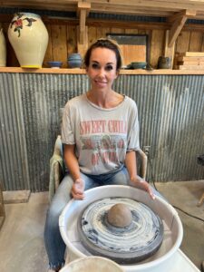Woman on pottery wheel
