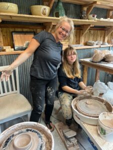 A lovely mom and daughter at the pottery studio