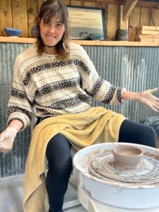 Pottery Lesson and girl on the wheel